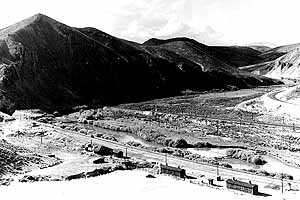 The little scatter of structures at Tonka Siding are gone now, but the Tonka Tunnel, far left center, is still there and quite visible from I-80 which now proceeds through a tunnel of its own. Cpl Murphy started into the tunnel from its western portal. No historical monument marks the spot though. photo courtesy Northeastern Nevada Museum